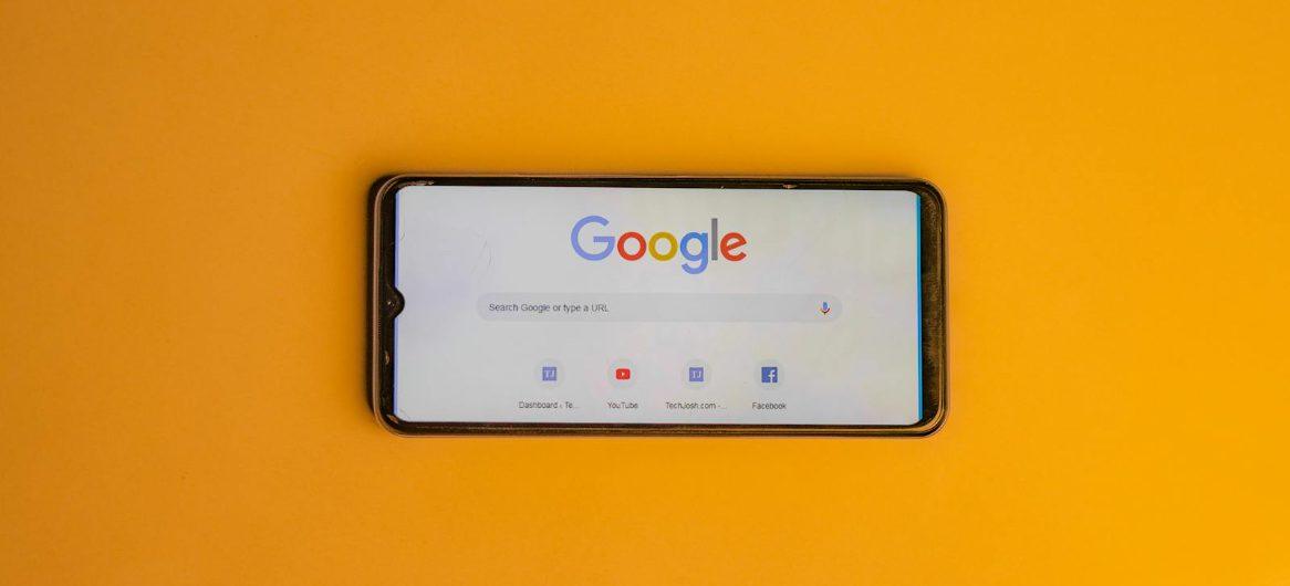 Smartphone showing Google search — Google Ads for Hotels