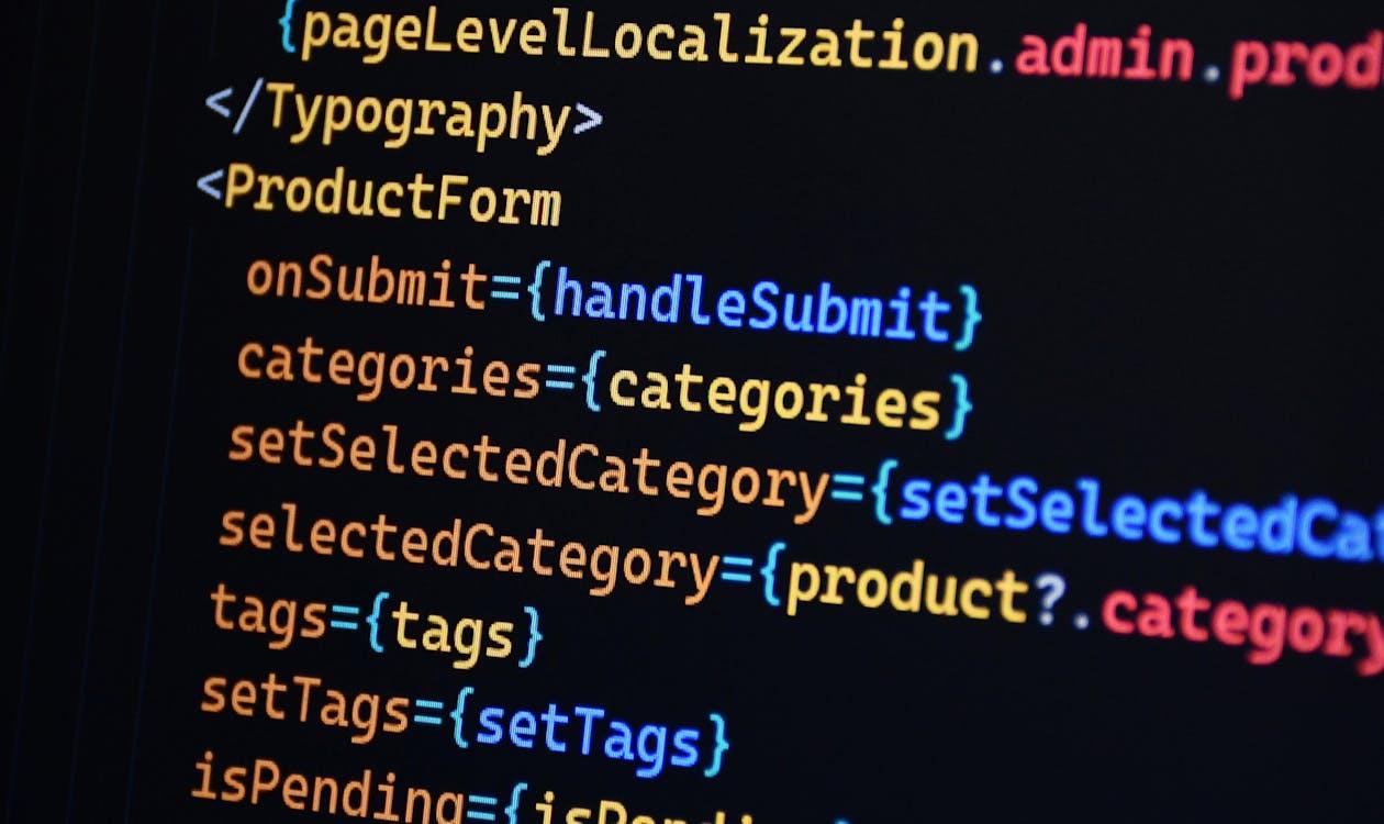 Code on computer screen representing hotel website speed optimisation