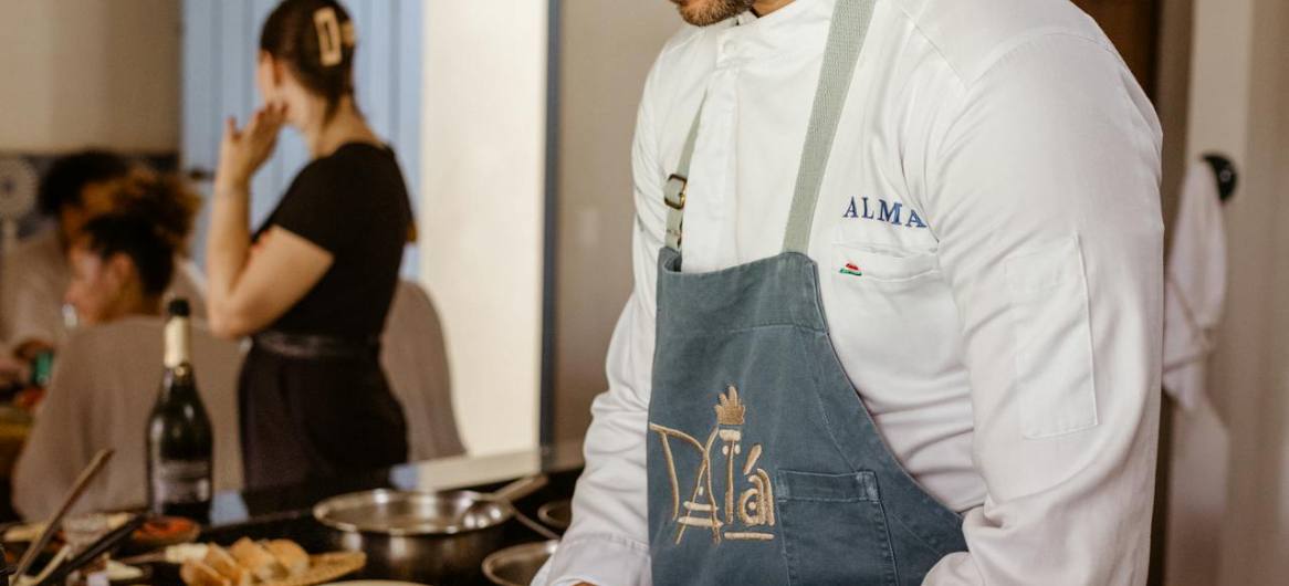 Chef preparing food — how to brand your restaurant