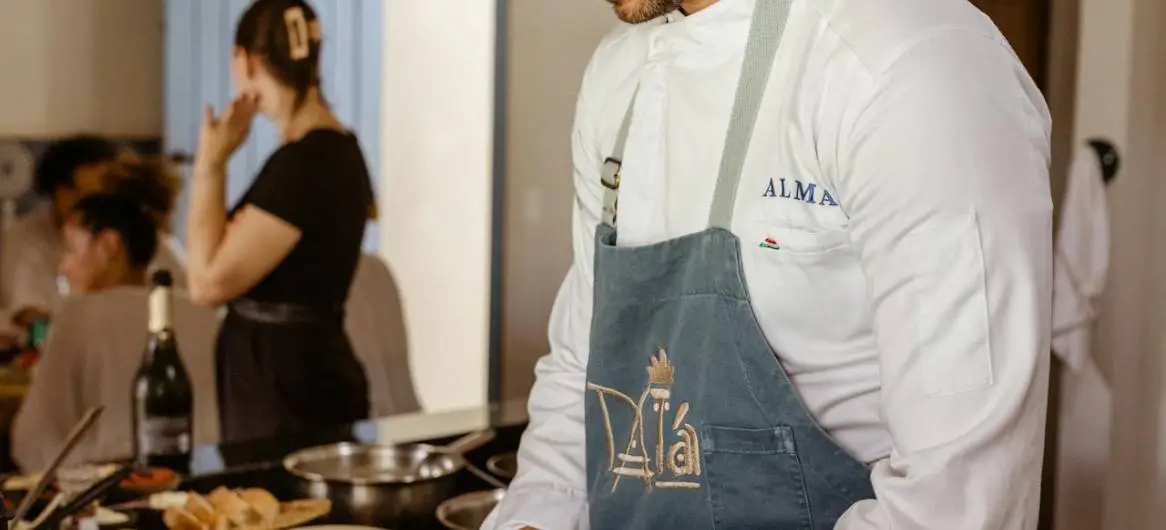 Chef preparing food — how to brand your restaurant