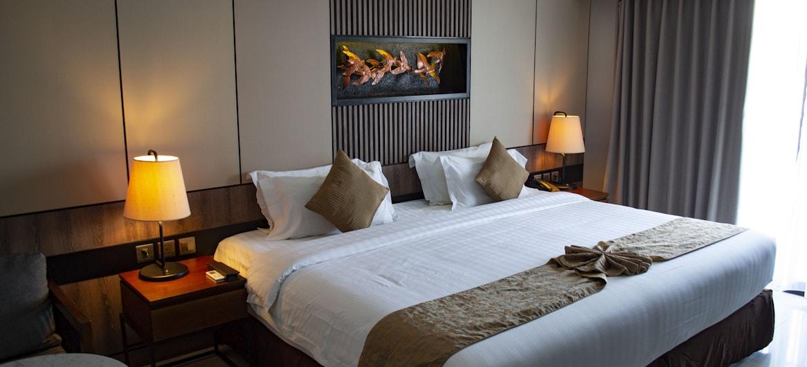 Luxury hotel room with white linen — RevPAR hotel benchmarks 2026