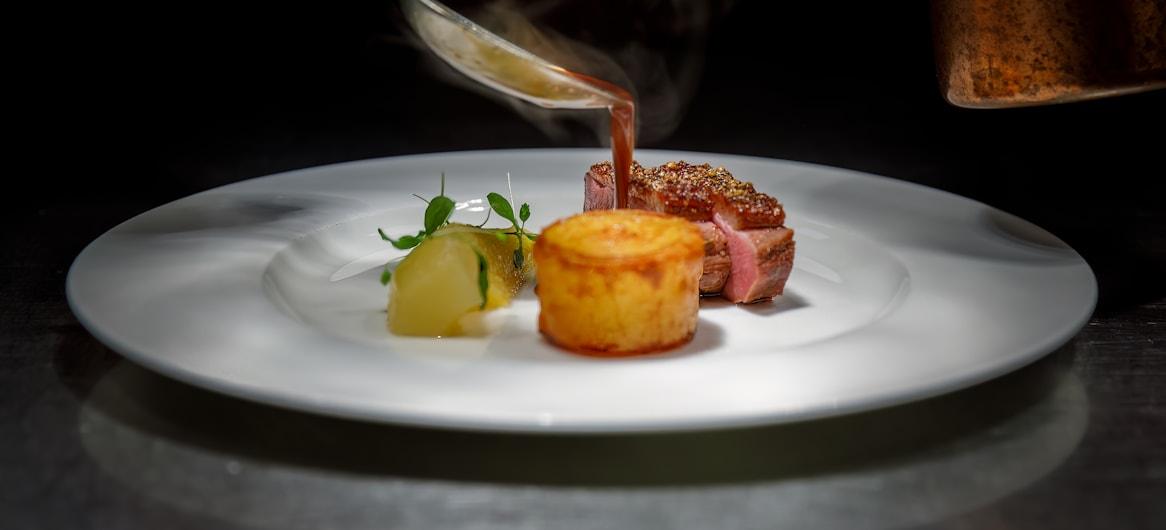 Chef plating steak dish — restaurant marketing ROI benchmarks 2026
