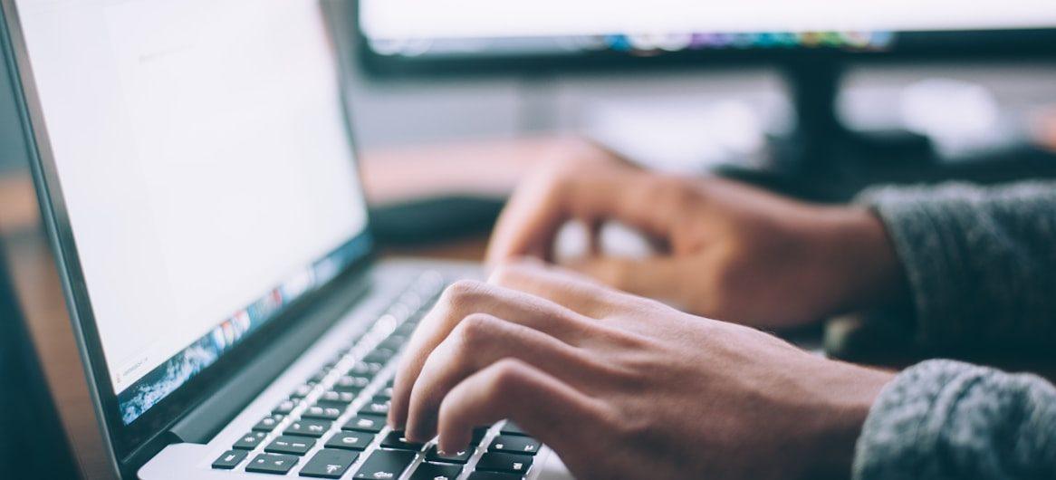 Person Using MacBook Pro CRM Integration